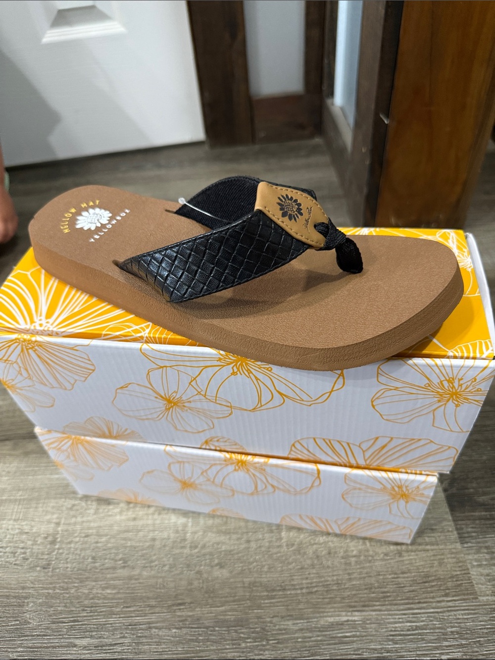 Yellow Box Black Woven Strap Flip Flop Sandal with Brown Footbed